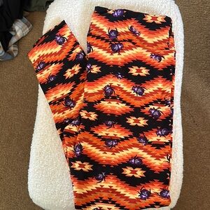 LuLaRoe Orange and Black Patterned Leggings